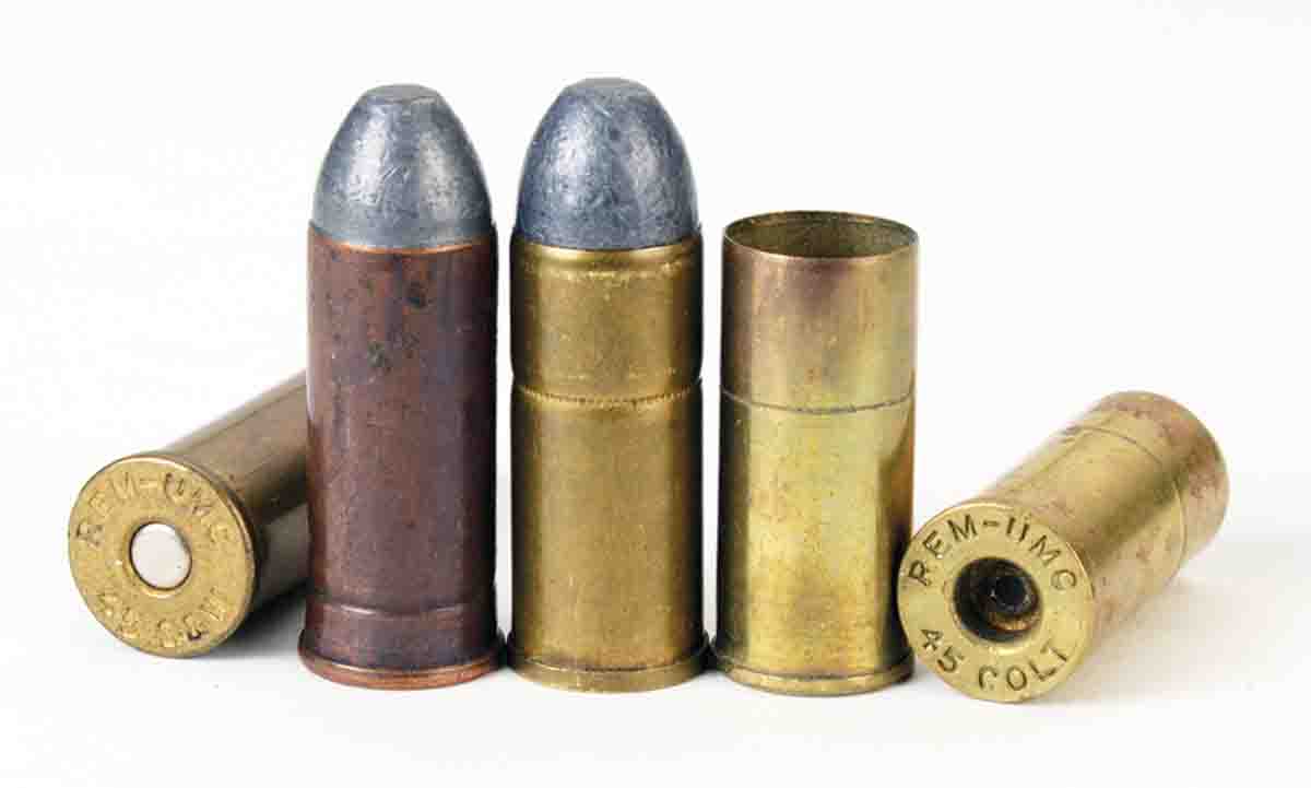 The two loaded cartridges at left are Remington-UMC .45 S&W and U.S. Government .45 S&W (Schofield). The cartridge at right is a Remington-UMC .45 Colt round with fired Remington-UMC short .45 cases.